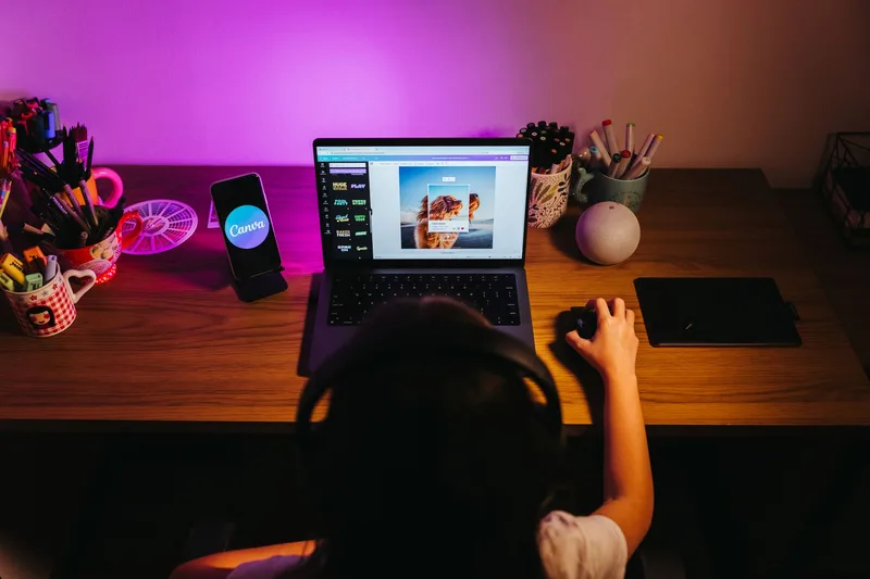 Digital templates displayed on a laptop screen at a bright home workspace