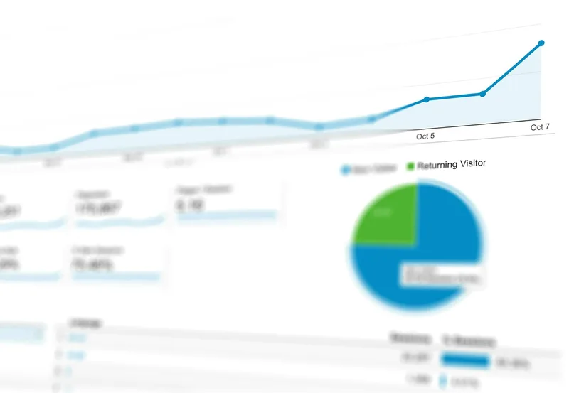 Etsy Shop Manager showing listing stats with views, favorites, and conversion rate metrics