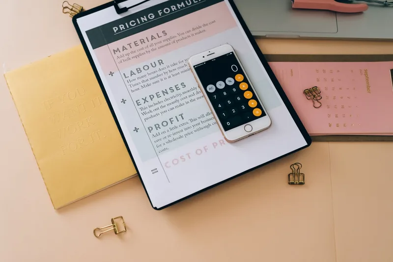Business planning workspace with organized notes and strategy materials