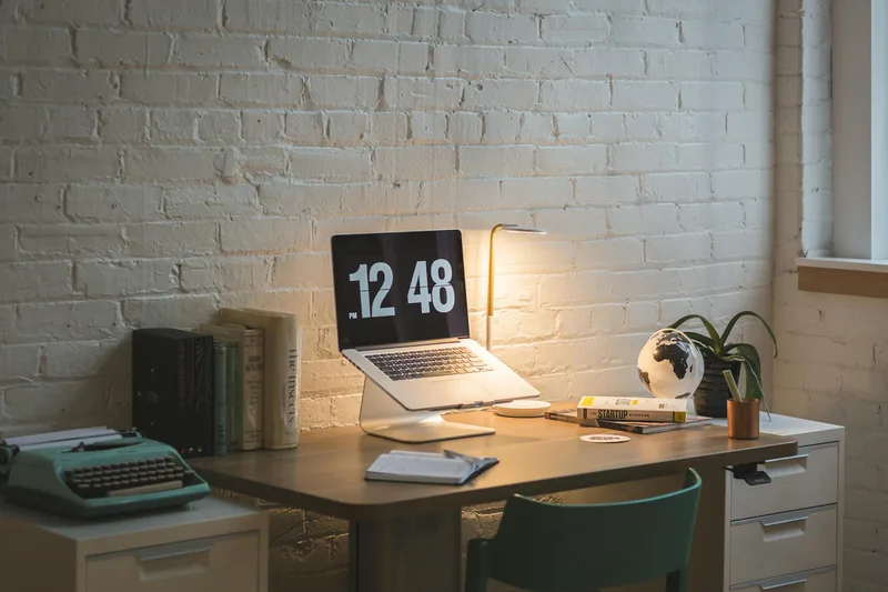 Organized desk workspace for creating digital products to sell as a side hustle