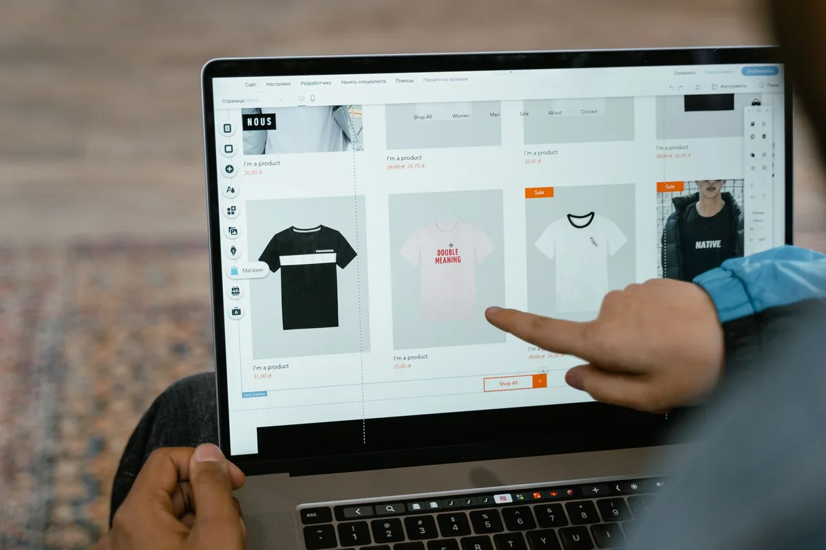 Person comparing marketplace options for selling digital products online